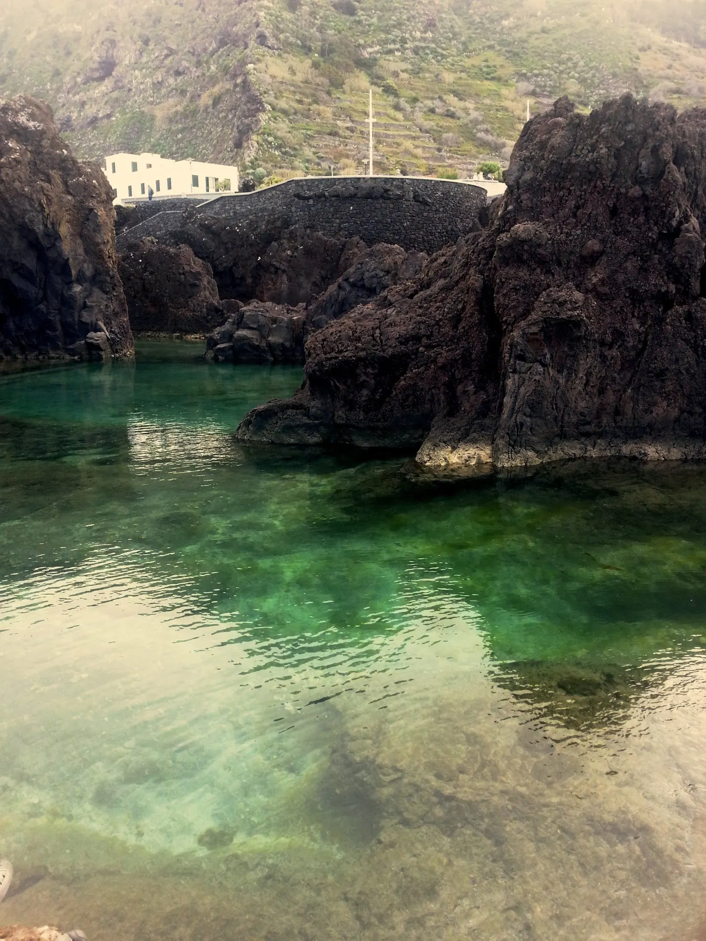 A natural pool in volcanic rock