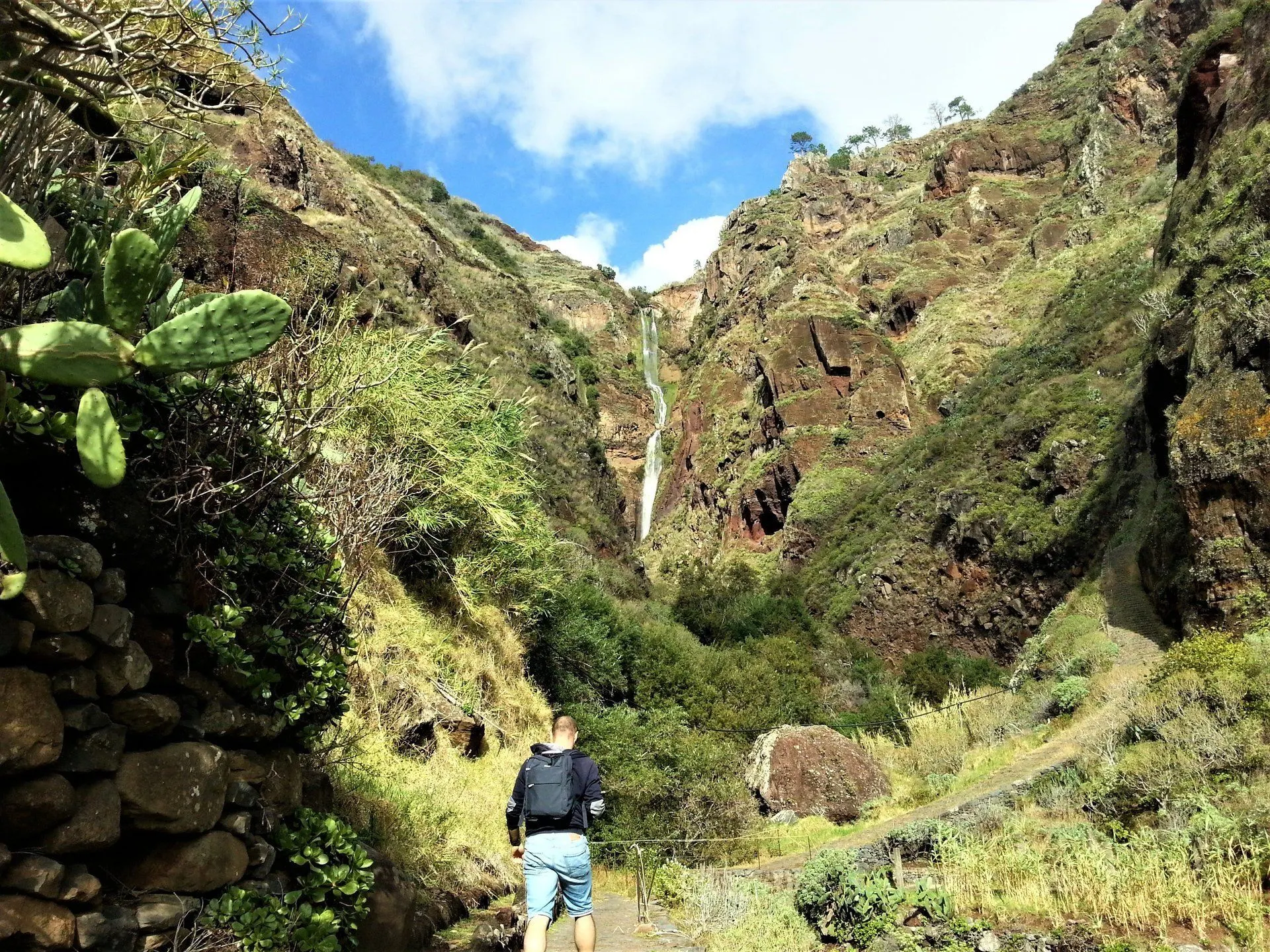Hiking through a green valley